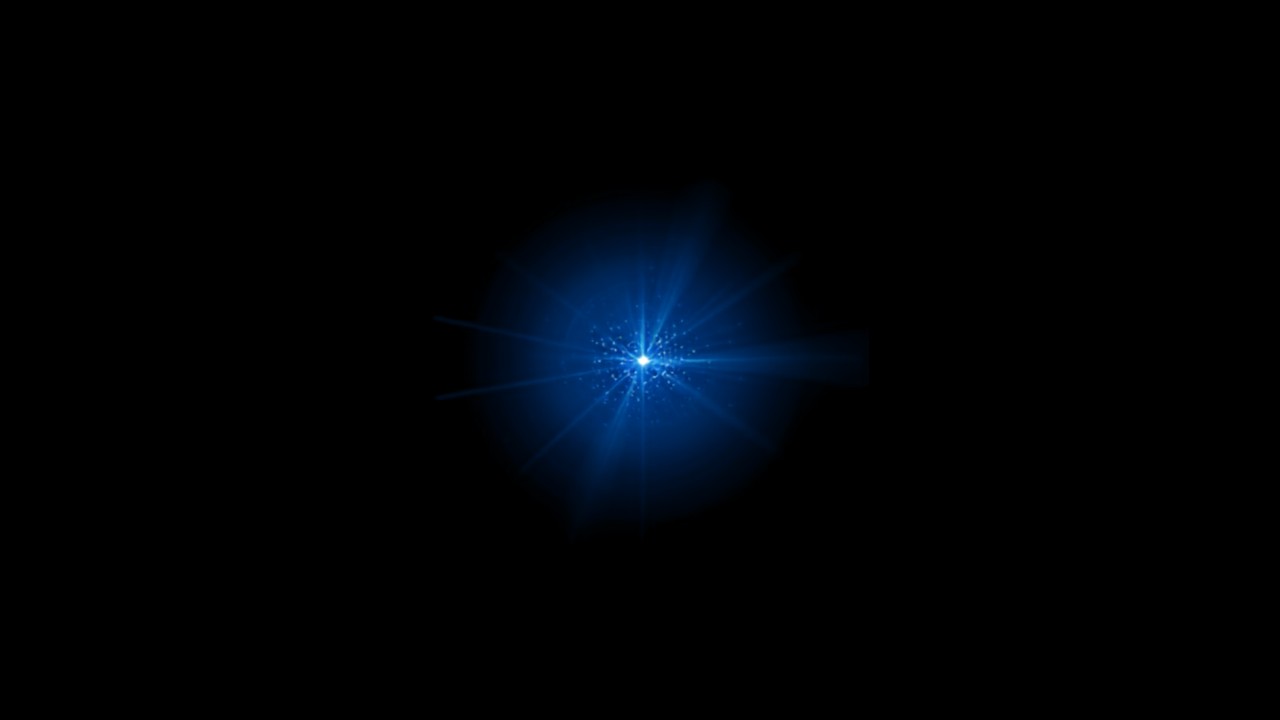 Punto di luce blu nitido circondato da bagliore sfocato su sfondo nero, simbolo di chiarezza nel caos